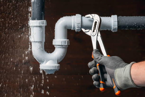 Professional Drain Cleaning technician working in Camden, AR